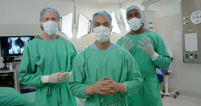 Multicultural Team of Surgeons Wearing Green Scrubs in Operating Room - Download Free Stock Images Pikwizard.com