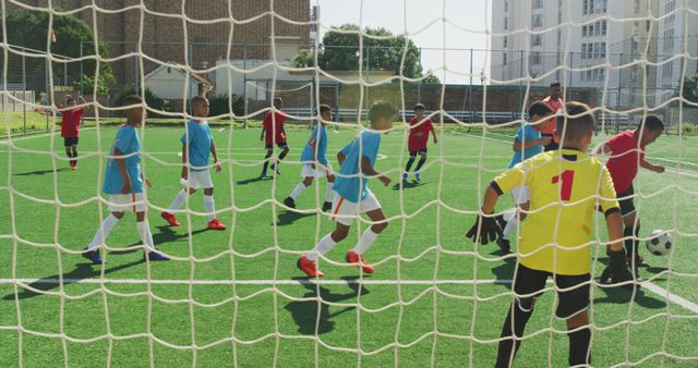 Children Playing Youth Soccer on Green Field in Uniforms - Download Free Stock Images Pikwizard.com