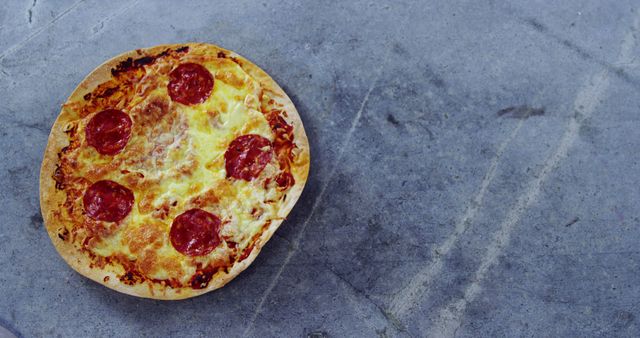 Delicious Pepperoni Pizza on Grey Stone Surface - Download Free Stock Images Pikwizard.com