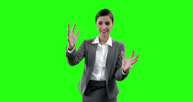Businesswoman Engaging in Interactive Presentation on Green Screen - Download Free Stock Images Pikwizard.com