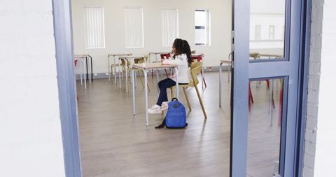 African american student engaged in classroom study