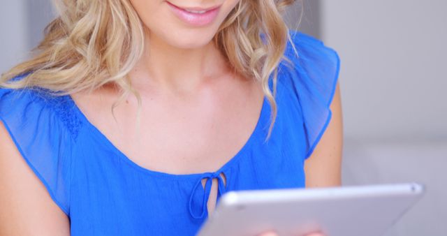 Smiling Woman Using Digital Tablet Indoors - Download Free Stock Images Pikwizard.com