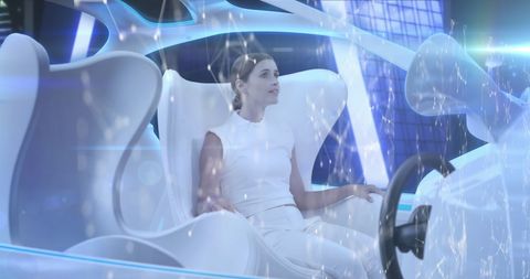 a woman is seated in a high-tech, futuristic car, surrounded by a digital network interface indicative of advanced self-driving technology. the glowing blue hues and sleek design of the interior suggest cutting-edge innovation. ideal for promoting ideas related to future transportation, smart technology advancements, modern lifestyles, or high-tech automotive design.