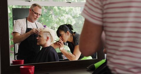 Professional Hairdressers Dyeing Client's Hair at Salon - Download Free Stock Images Pikwizard.com