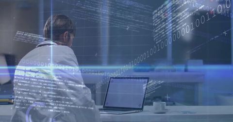 Researcher in Lab Coat Analyzing Holographic Data Stream Over Laptop in Modern Laboratory
