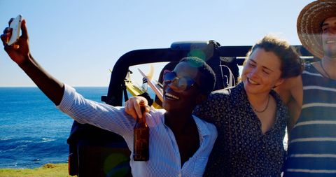 Friends Enjoying Selfie by Ocean During Fun Road Trip - Download Free Stock Images Pikwizard.com