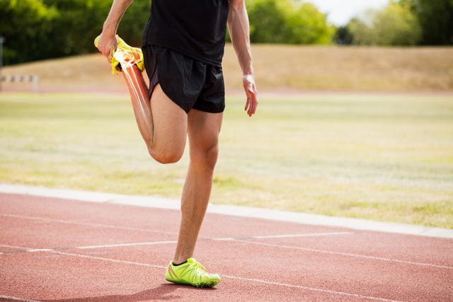 Athlete Stretching on Track With Highlighted Leg Bones - Download Free Stock Photos Pikwizard.com