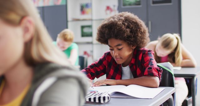 Young Students Learning in Classroom Setting, Focused on Studies - Download Free Stock Images Pikwizard.com