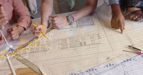 Women Collaborating on Architectural Blueprints with Data Analytics Overlay for Projects