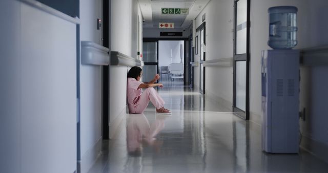 Lonely Child Sitting in Hospital Corridor - Download Free Stock Images Pikwizard.com