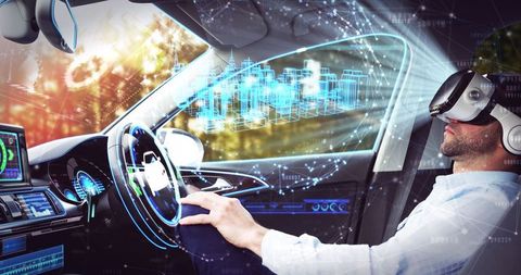 Businessman using vr headset in self-driving car with virtual city map overlay