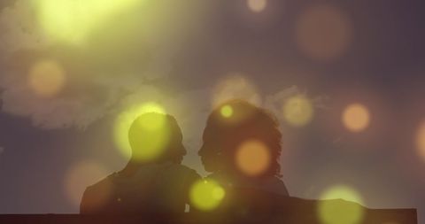 Romantic Silhouette Couple Under Neon Lights
