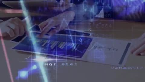 Team Reviewing Digital Finance Charts with Futuristic Interface