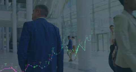 Business Professionals with Financial Graph Overlay in Office