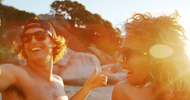 Happy Couple Enjoying Sunset Beach Vacation - Download Free Stock Images Pikwizard.com