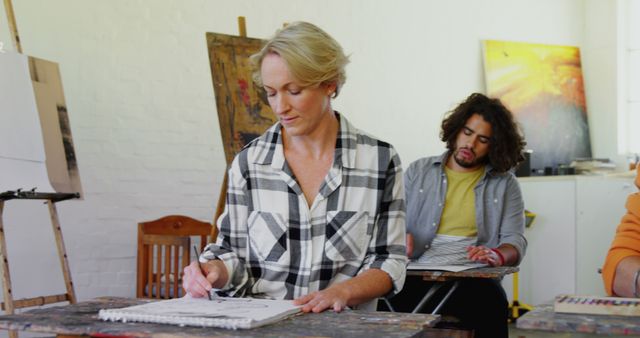 Adults Practicing Drawing in Art Class with Natural Light - Download Free Stock Images Pikwizard.com