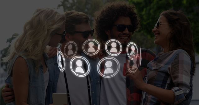 Image of rotating profile icon in circles over diverse friends talking selfie. Digital composite, multiple exposure, love, togetherness, friendship, abstract and technology concept.