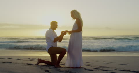 Romantic Beach Proposal at Sunset