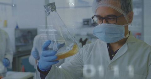 Scientist Conducting Experiment with Erlenmeyer Flask in Modern Lab