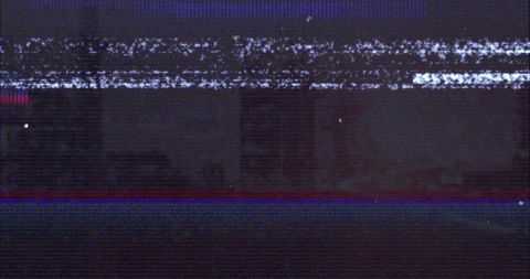 Flickering analog static with red and blue distorted lines
