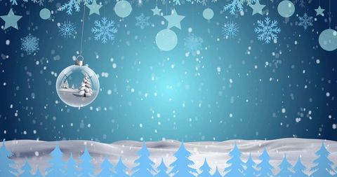 Hanging glass bauble with miniature snowy pines over turquoise winter bokeh background
