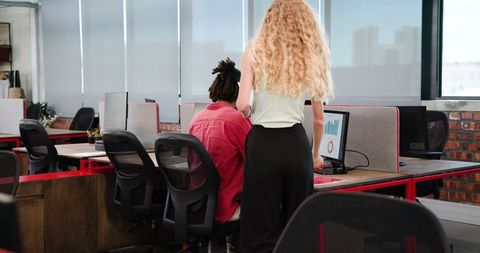 Team collaboration discussing business strategy at modern office