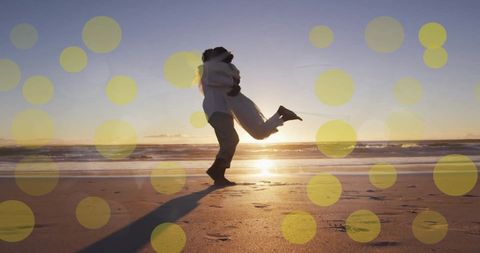 Joyful couple embracing on romantic beach wedding