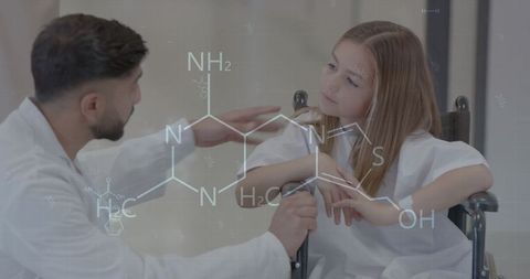 Doctor Discussing Medicine with Young Girl in Wheelchair