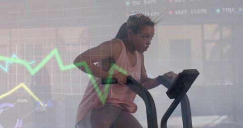 Energetic female exercising with analytics overlay