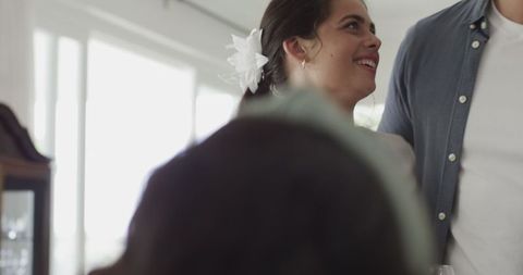 Joyful Moment at a Wedding Reception with Happy Guests