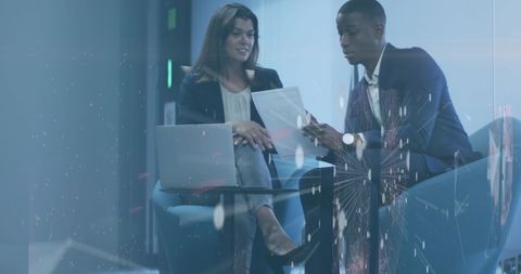 Business Professionals Analyzing Data in Modern Digital Office