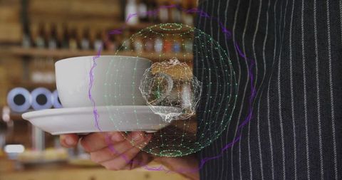 Barista holding espresso cup and saucer with holographic orb display in coffeehouse