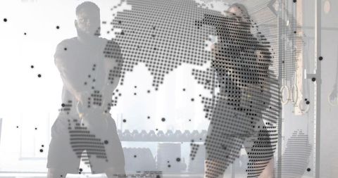 Dynamic kettlebell duo swinging in backlit gym with dotted global map overlay