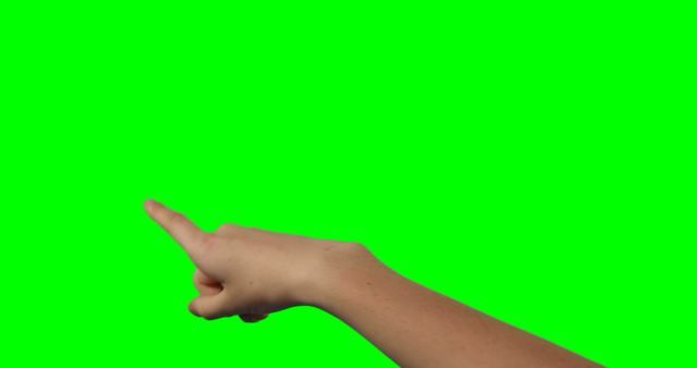Hand pointing against green screen background. Ideal for overlay editing, creating instructional content, educational videos, or enhancing visual directions. Great for graphic designers, video editors, and presentation creators looking to add a directional indicator or interactive gesture.