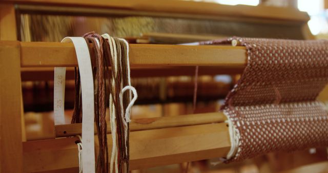 Close-Up of Wooden Weaving Loom with Finished Fabric - Download Free Stock Images Pikwizard.com