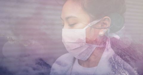 Woman in Mask with Winter Scenery Overlay during Holiday Season