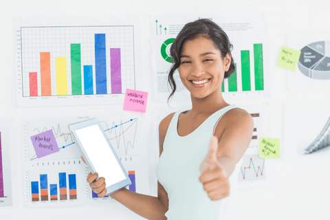 Confident Businesswoman in Office Presenting Digital Tablet and Thumbs Up - Download Free Stock Videos Pikwizard.com