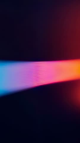 Vertical neon beam loop pulsing and cycling vibrant colors on dark futuristic background