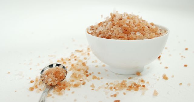 Himalayan Pink Salt in Bowl and Spoon on White Background - Download Free Stock Images Pikwizard.com