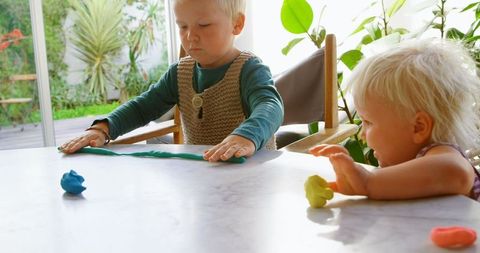 Caucasian Siblings Creating Art with Colorful Clay Indoors - Download Free Stock Images Pikwizard.com