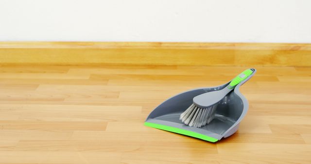 Dustpan and Brush on Wooden Floor - Download Free Stock Images Pikwizard.com