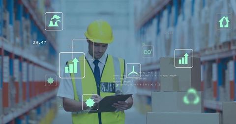 Warehouse inspector monitoring smart logistics with clipboard and safety vest