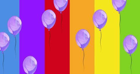 Purple balloons against vibrant rainbow stripes