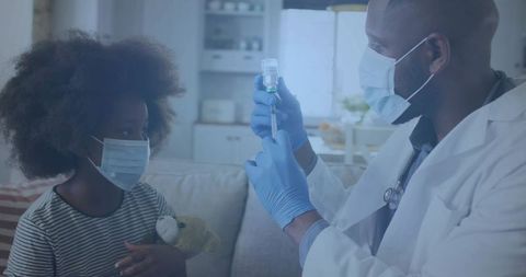 Healthcare Professional Preparing Vaccine for Child at Home