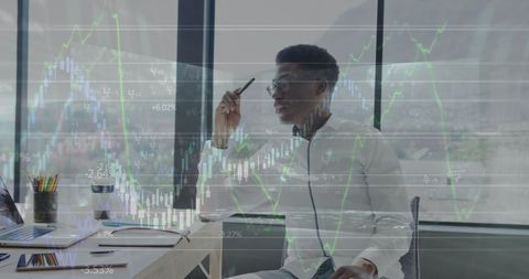 African American Businessman Analyzing Financial Data on Laptop - Download Free Stock Images Pikwizard.com