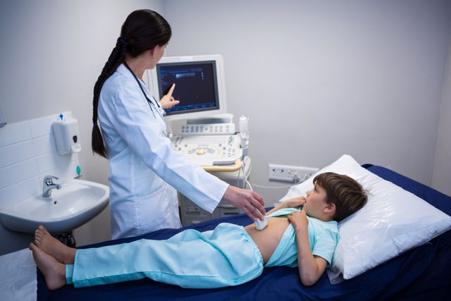 Female Doctor Explaining Sonography Report to Young Patient - Download Free Stock Photos Pikwizard.com