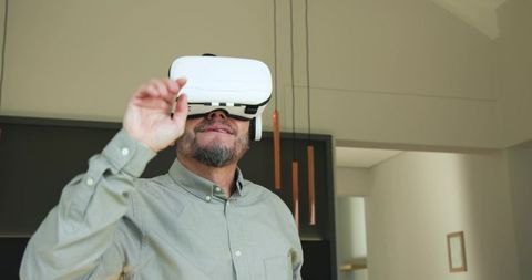 Man Interacting with VR in Modern Living Room