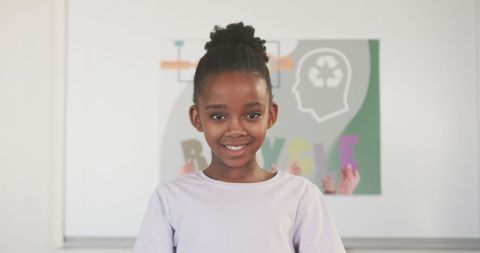 Confident Young Girl in Classroom Embracing Education