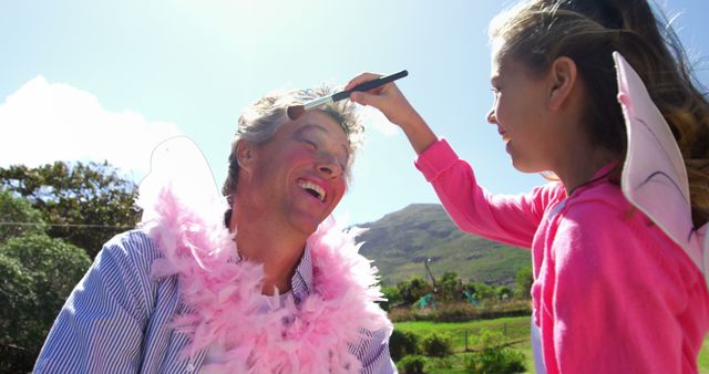 Father and Daughter Playing Dress-Up Outdoors on Sunny Day - Download Free Stock Images Pikwizard.com