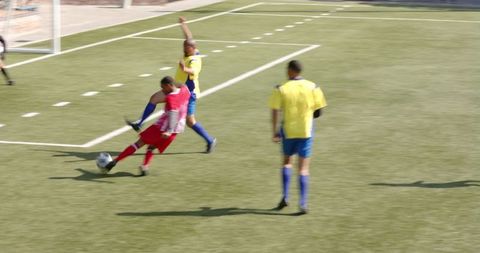 Intense soccer match action on vibrant green field